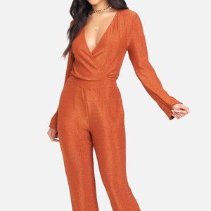 Bebe Sparkle Knit Long Sleeve Jumpsuit in Copper